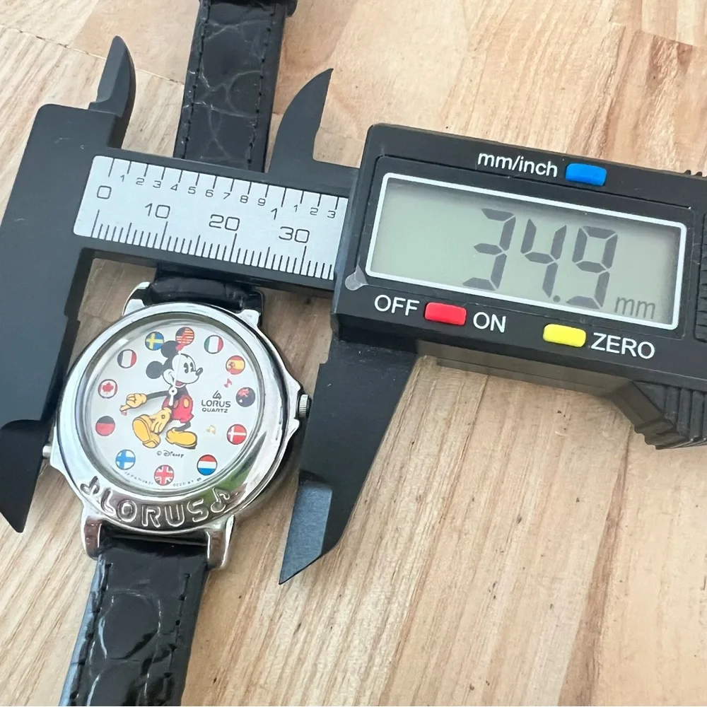 Vintage Lorus Disney Mickey Mouse Small World musical watch NEW BATTERY